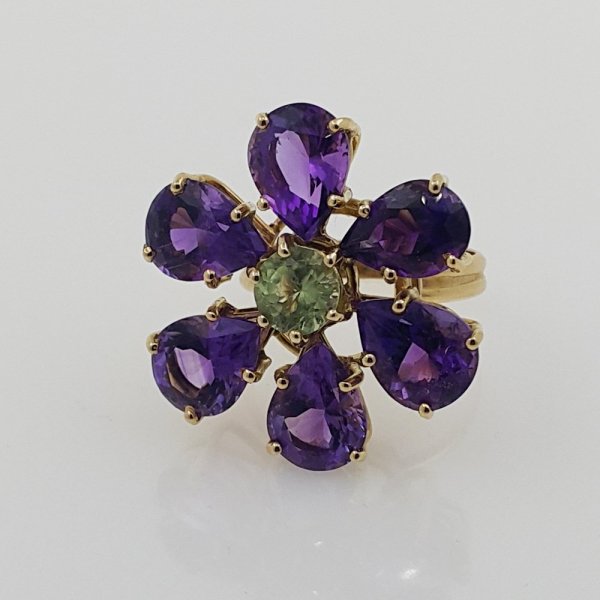 18k. yellow gold ring with natural Amethyst & Peridot 16.00 carat